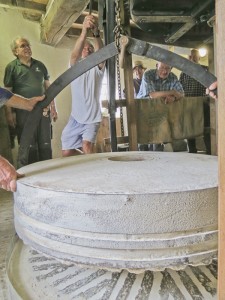 The runner stone is being slowly raised from the bed stone